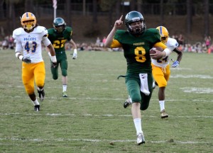 Paradise High quarterback Kenny Bengson runs in a touchdown in the first quarter of the Bobcats' game against Grant on Aug. 30 at Om Wraith Field. Photo by Jason Halley/Chico Enterprise-Record