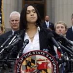 Marilyn Mosby, Baltimore state's attorney, pauses while speaking during a media availability, Friday, May 1, 2015 in Baltimore. Mosby announced criminal charges against all six officers suspended after Freddie Gray suffered a fatal spinal injury while in police custody. (AP Photo/Alex Brandon)