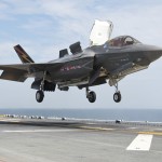 130814-O-ZZ999-280 ATLANTIC OCEAN (Aug. 14, 2013) An F-35B Lightning II aircraft lands aboard the amphibious assault ship USS Wasp (LHD 1) during the second at-sea F-35 developmental test event. The F-35B is the Marine Corps variant of the Joint Strike Fighter and is undergoing testing aboard Wasp.  (U.S. Navy photo courtesy of Lockheed Martin by Andy Wolfe/Released)/Released)